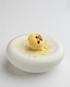 Single mango fig bite closeup